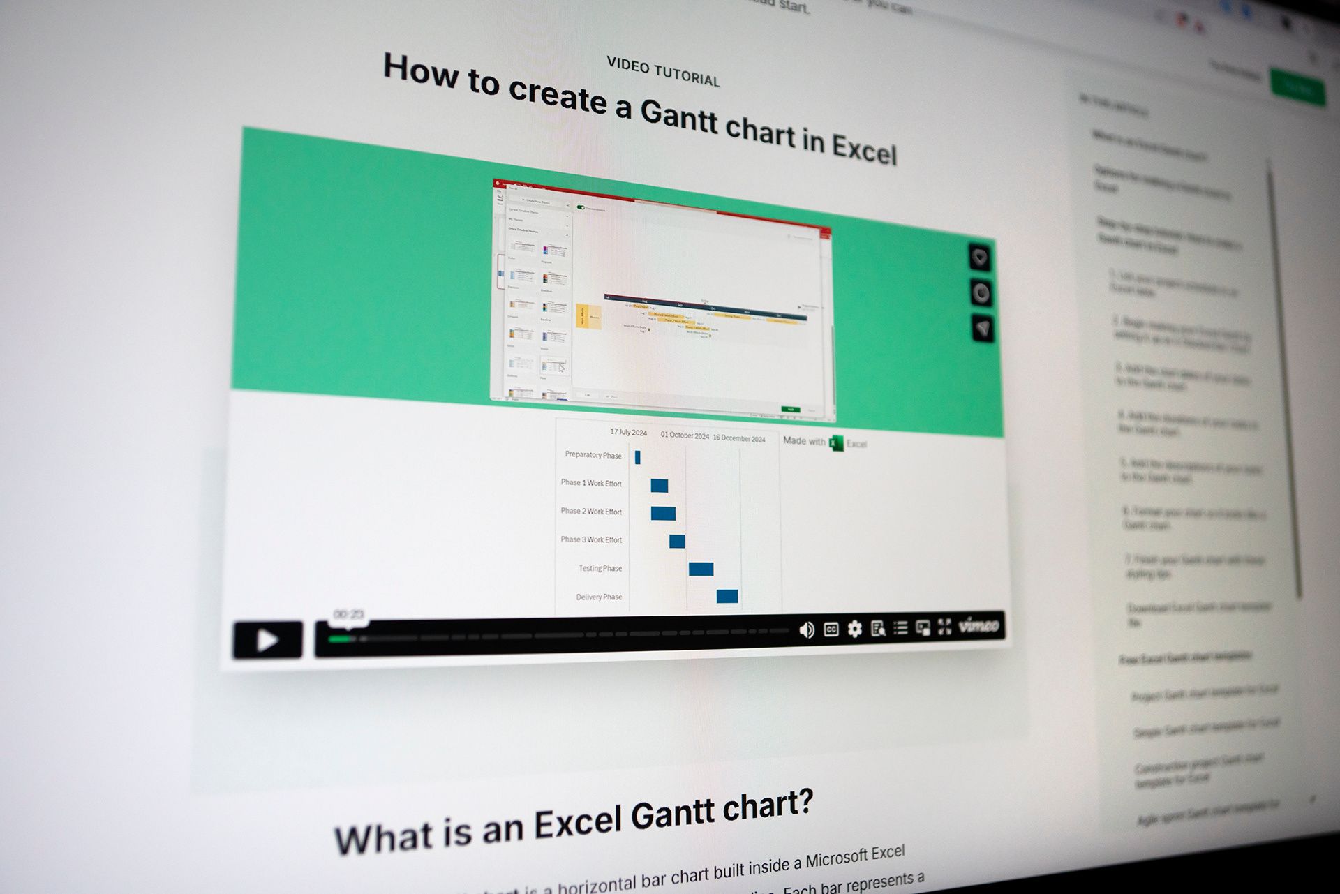 Blurred screenshot of the 'How to create a Gantt chart in Excel' video tutorial page